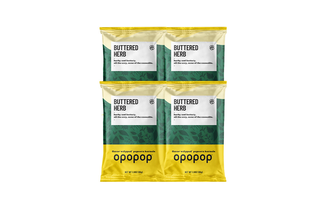 A single green leaf against a white background.