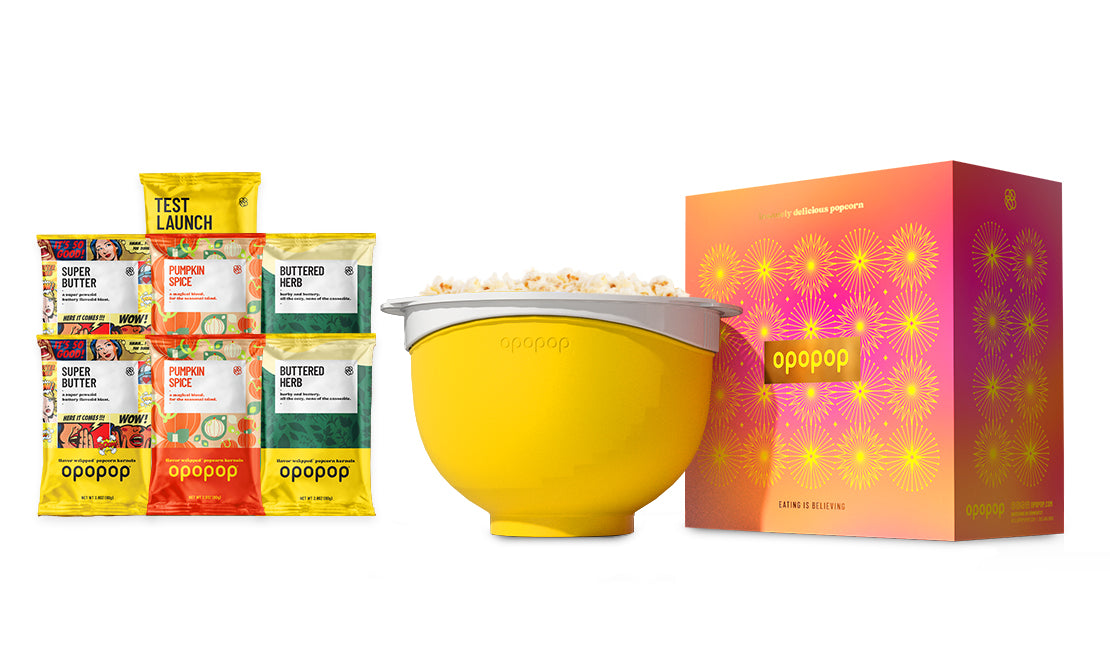 A single green leaf against a white background.