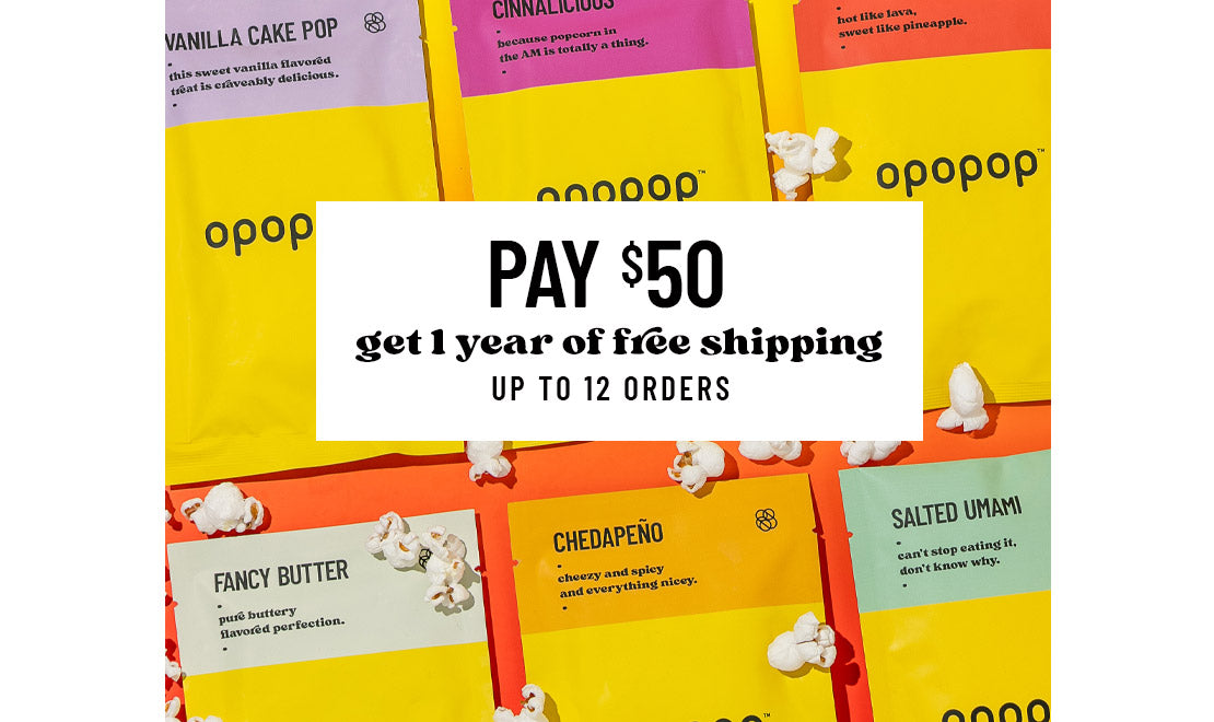 A single green leaf against a white background.