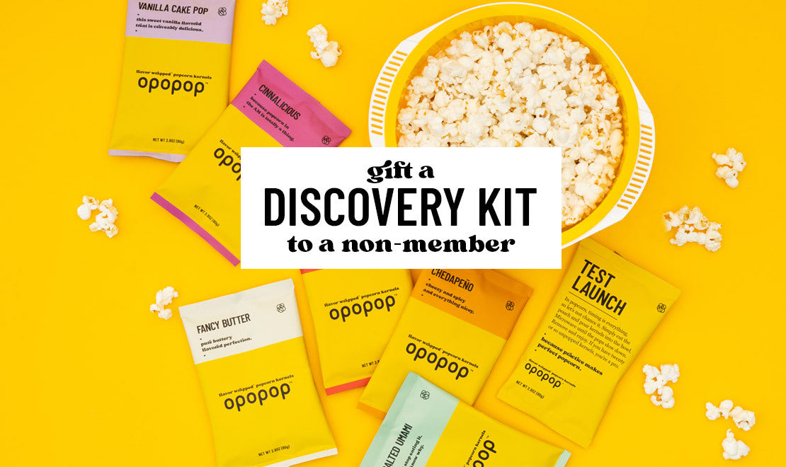 A single green leaf against a white background.