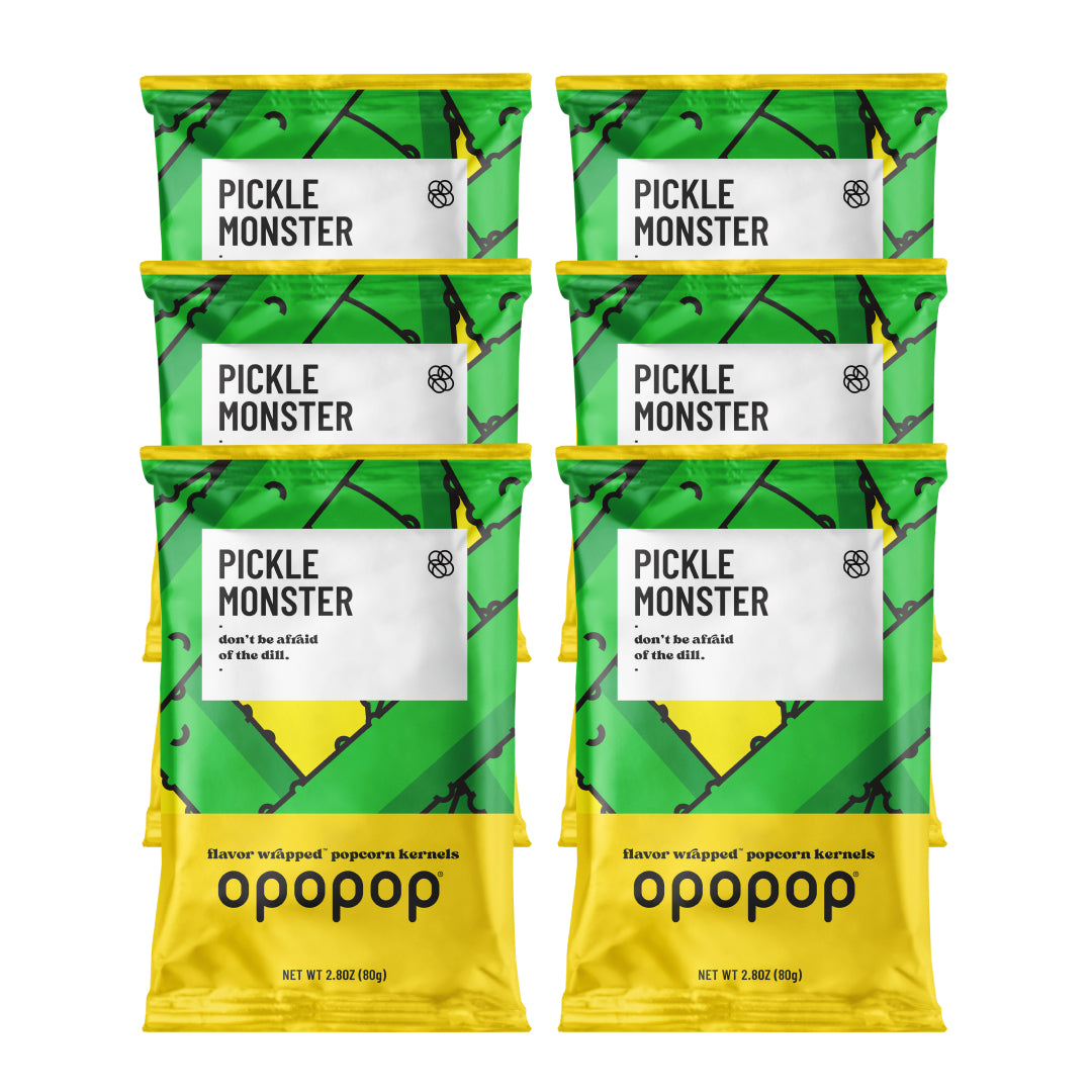 A single green leaf against a white background.